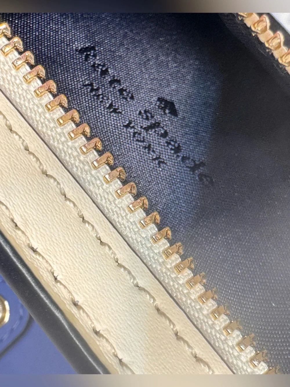 kate spade cream zip